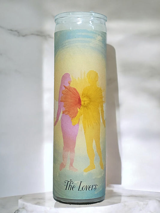 Candle displaying the Lovers design against a marble surface.